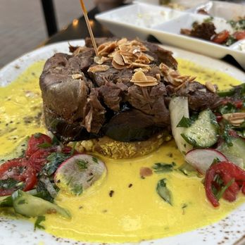 DishDash - MAKLOUBEH - $38 - With BRAISED LAMB - Layers of Eggplant, Cauliflower, Potatoes, Garbanzo, Freekeh, saffron-yogurt, salata. - Middle Eastern Near Me - Sunnyvale, California