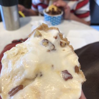Mighty Moo Ice Cream - Salted caramel butter pecan half eaten - Ice Cream & Frozen Yogurt Near Me - Youngtown, Arizona