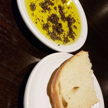 Carrabba's Italian Grill - Bread with olive oil - Italian Near Me - Ocala, Florida Carrabba's Italian Grill - Bread with olive oil - Italian Near Me - Ocala, Florida