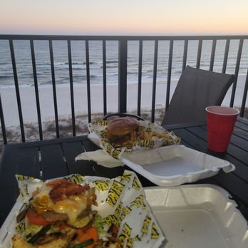 Flora-Bama Lounge, Package & Oyster Bar - Two Bama build your own burgers we got to and had on our balcony. Watching the waves. - Music Venues Near Me - Pensacola, Florida Flora-Bama Lounge, Package & Oyster Bar - Two Bama build your own burgers we got to and had on our balcony. Watching the waves. - Music Venues Near Me - Pensacola, Florida