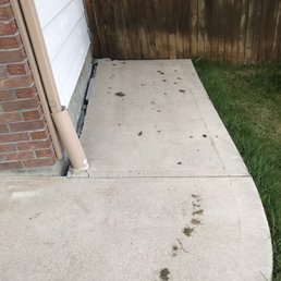 The poor clean up and the mud and debris that was left in the walkway.