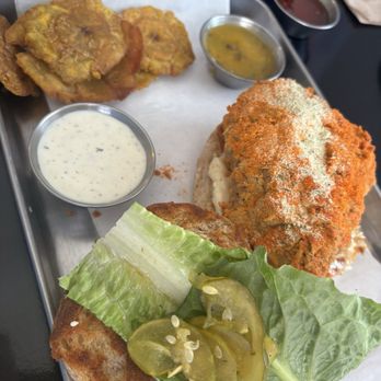 Revolutionary Wings - Buffalo chicken sandwich with Tostones! - Chicken Wings Near Me - San Antonio, Texas Revolutionary Wings - Buffalo chicken sandwich with Tostones! - Chicken Wings Near Me - San Antonio, Texas