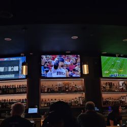 North & Maple Kitchen + Bar - The bar and plenty of tvs.