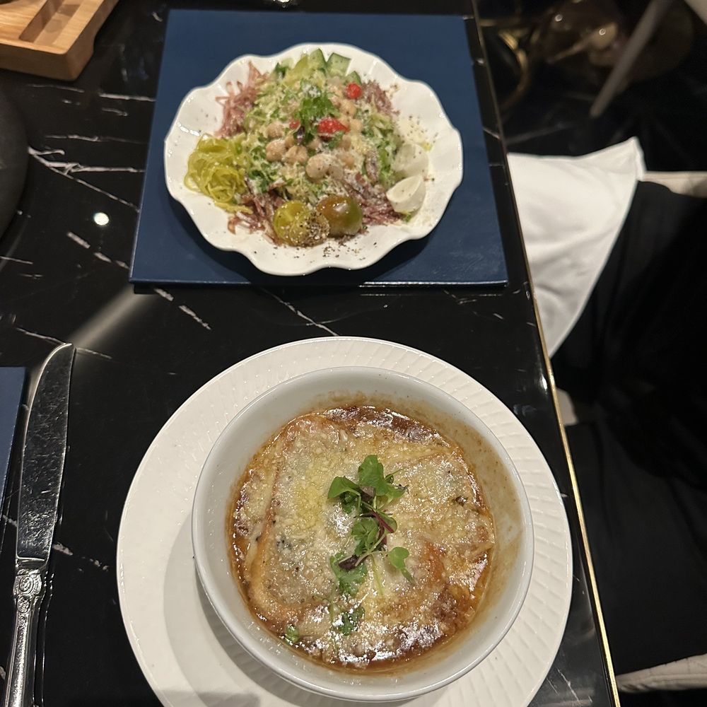 Prime 141 - Onion soup & chopped Italian salad - Steakhouses Near Me - Enterprise, Nevada Prime 141 - Onion soup & chopped Italian salad - Steakhouses Near Me - Enterprise, Nevada