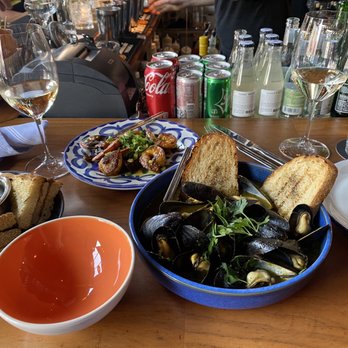 Extra Virgin - Steamed Mussels in Corn Broth and Shrimp - Tapas/Small Plates Near Me - Kansas City, Missouri Extra Virgin - Steamed Mussels in Corn Broth and Shrimp - Tapas/Small Plates Near Me - Kansas City, Missouri