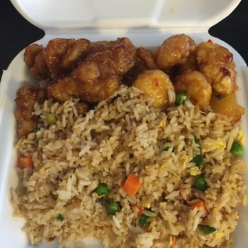 Panda Express - The Plate (2 mains and a side) with Orange Chicken on the left, Sweetfire Chicken on the right, and fried rice. - Fast Food Near Me - Hoover, Alabama Panda Express - The Plate (2 mains and a side) with Orange Chicken on the left, Sweetfire Chicken on the right, and fried rice. - Fast Food Near Me - Hoover, Alabama