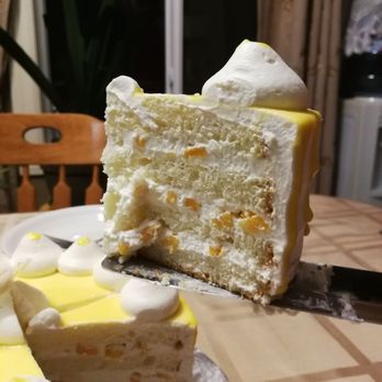 Jun's Bakery - a slice of cake being cut - Bakeries Near Me - Edmonton, Alberta Jun's Bakery - a slice of cake being cut - Bakeries Near Me - Edmonton, Alberta