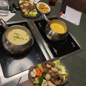 The Melting Pot - Wisconsin Trio and Fiesta with veggies, fruit and bread - Fondue Near Me - Austin, Texas The Melting Pot - Wisconsin Trio and Fiesta with veggies, fruit and bread - Fondue Near Me - Austin, Texas