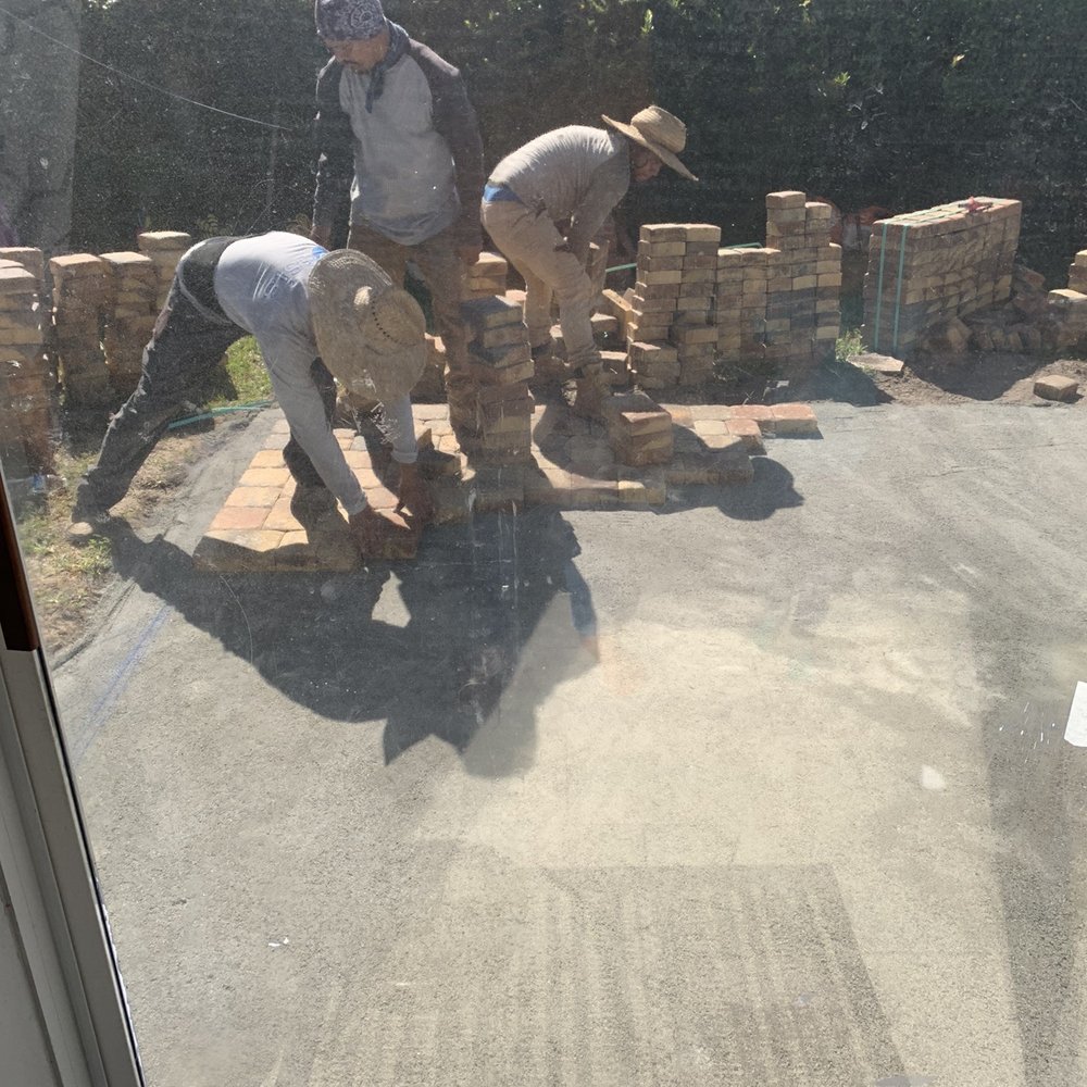 Signature Specialty Contractors - two men building a brick wall - General Contractors Near Me - Riverview, Florida Signature Specialty Contractors - two men building a brick wall - General Contractors Near Me - Riverview, Florida