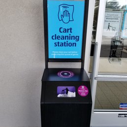 The cart cleaning station full of dirty wipes and out of clean wipes