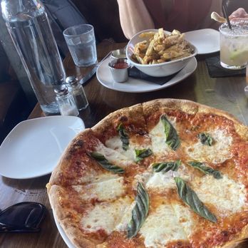 Luce Bar & Kitchen - Margherita pizza and fries - American Near Me - San Diego, California Luce Bar & Kitchen - Margherita pizza and fries - American Near Me - San Diego, California