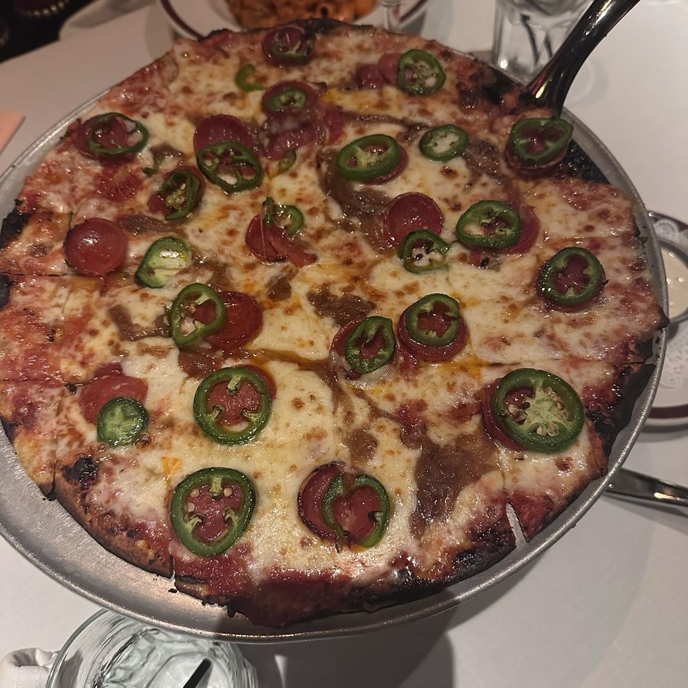 Hot Papi's pizza (pepperoni, onions, jalapeños, and hot honey) Hot Papi's pizza (pepperoni, onions, jalapeños, and hot honey)