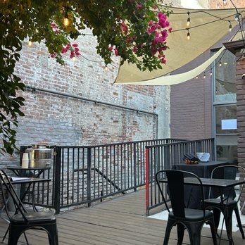 We Olive Wine Bar & Marketplace - Shady and cool covered patio - Wine Bars Near Me - Pasadena, California We Olive Wine Bar & Marketplace - Shady and cool covered patio - Wine Bars Near Me - Pasadena, California