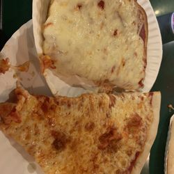 Papa Santo's Pizza - My Plain Cheese Pizza and Plain Sicilian Cheese Pizza.