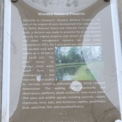 Veterans Park Splash Pad - Wooded Wetland Preserve signage