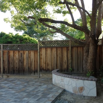 Nine Orange Landscaping - About 4 feet in from fence by request (garden area), nice sitting wall under tree. Turned out exactly like we wanted! - Landscaping Near Me