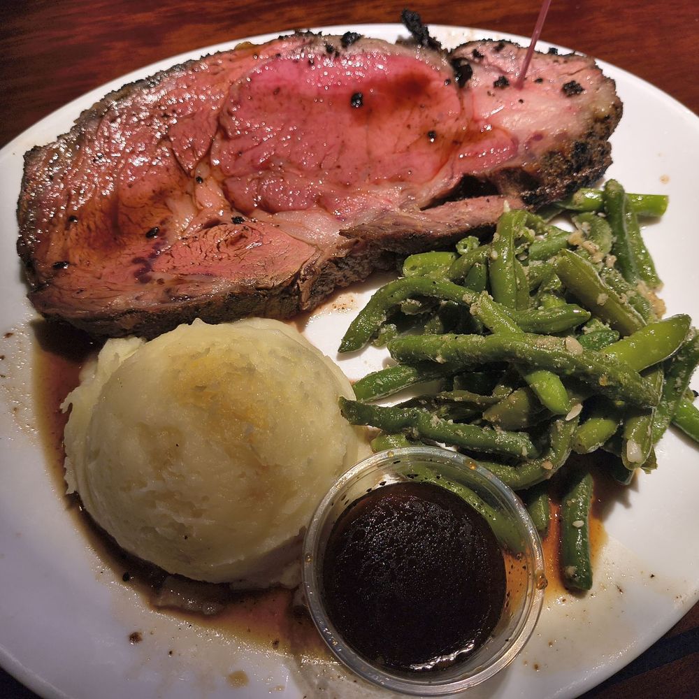 Seasoned Prime Rib special, garlic mashed potatoes and garlic green beans. Also served with a horseradish Au Jus Seasoned Prime Rib special, garlic mashed potatoes and garlic green beans. Also served with a horseradish Au Jus