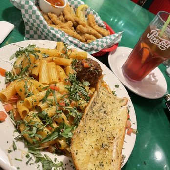 Oregano's - Oreganos big rig pasta. Garlic bread and meat ball, fried calamari appetizer in the back. - Pizza Near Me - Mesa, Arizona