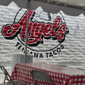 Angel's Tijuana Tacos - Seating and sign. - Tacos Near Me - Santa Ana, California