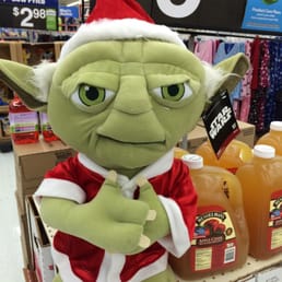 a yodape dressed as santa claus a yodape dressed as santa claus