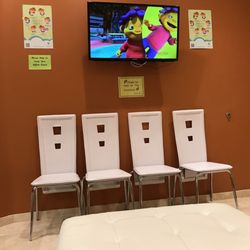 OC Pediatrics Medical Group - Nice office I think the color choice is bold for choosing white leather seats for waiting room given it is a children's doctors office lol