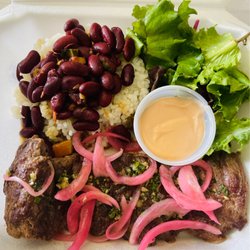 Mesa Latina Food Truck - Grilled skirt steak with yummy surprise sauce Comes with salad and one side( rice and beans)