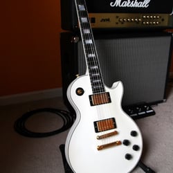 Rms Guitar Repair - Bob "squeezed" the nut on this white Custom.