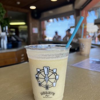 Stubborn Brothers - a drink in a plastic cup with a blue straw - New American Near Me - North Wildwood, New Jersey Stubborn Brothers - a drink in a plastic cup with a blue straw - New American Near Me - North Wildwood, New Jersey