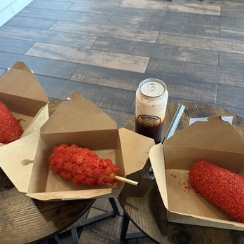 Mochinut - Long Beach - From left to right:   Hot Cheetos Half and Half  Potato Half and Half with Hot Cheetos  Hot Cheetos Mozzarella - Donuts Near Me - Long Beach, California