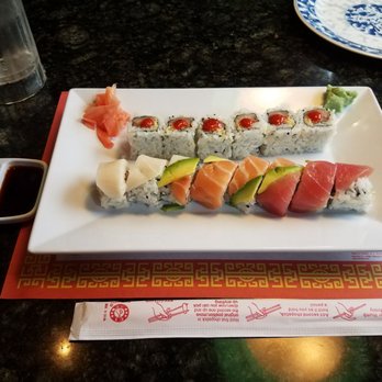 Jade Palace - My sushi order. Top one is the spicy yellowtail roll and the bottom one is the rainbow roll - Chinese Near Me - Bellevue, Nebraska Jade Palace - My sushi order. Top one is the spicy yellowtail roll and the bottom one is the rainbow roll - Chinese Near Me - Bellevue, Nebraska