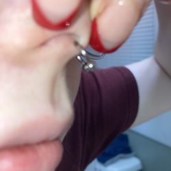 Living Canvas Tattoo & Body Piercing - The piercing is in my cartilage