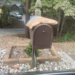 U S Government Salem Post Office - My package sitting on top of the mailbox, which would have fit inside