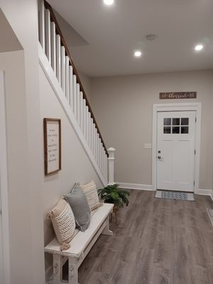 Amon's Remodeling Logo