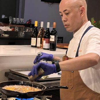 Fond - Chef preparing a mango flambe - Asian Fusion Near Me - Lahaina, Hawaii Fond - Chef preparing a mango flambe - Asian Fusion Near Me - Lahaina, Hawaii