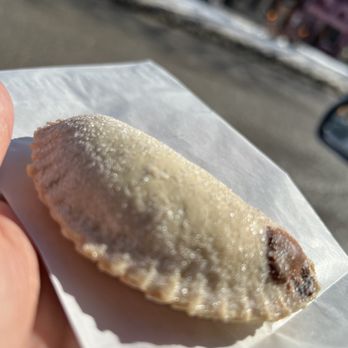 Butterfly Cookies - a hand holding a pastry - Bakeries Near Me - Chicago, Illinois Butterfly Cookies - a hand holding a pastry - Bakeries Near Me - Chicago, Illinois