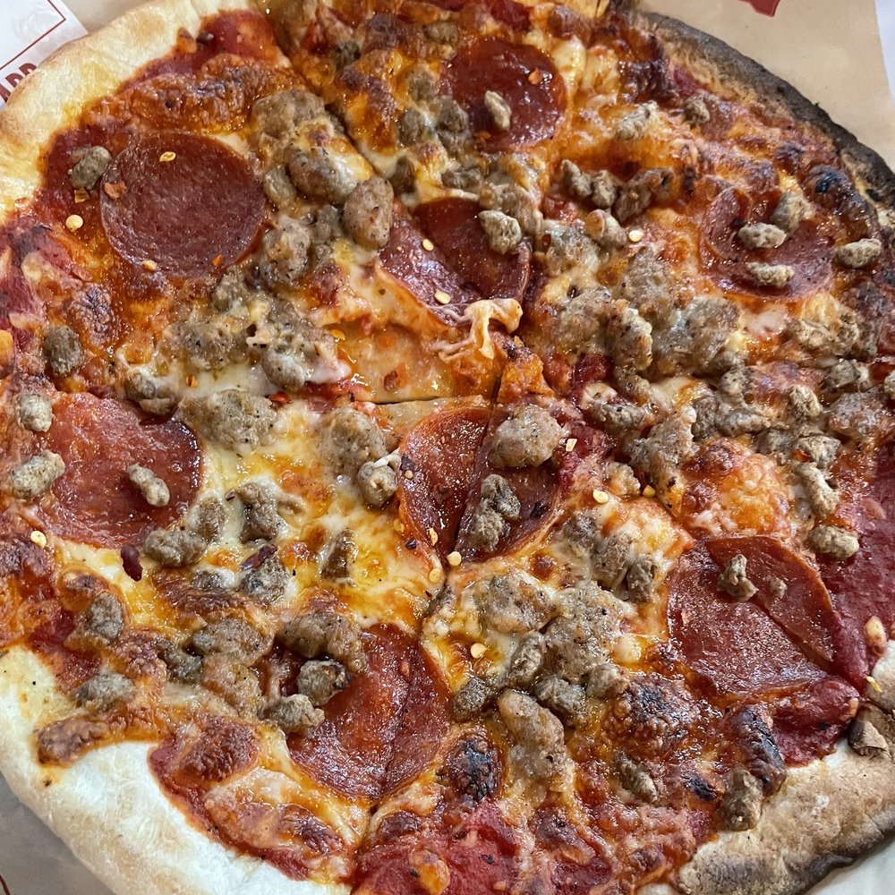 Mad Dog Pizza. Delicious. Mad Dog Pizza. Delicious.