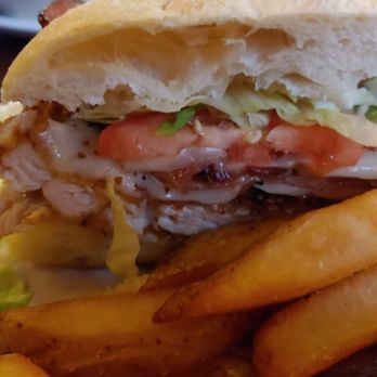 The Pub - Rookwood - Crispy Chicken Sandwich close-up of the cross section - Pubs Near Me - Cincinnati, Ohio The Pub - Rookwood - Crispy Chicken Sandwich close-up of the cross section - Pubs Near Me - Cincinnati, Ohio