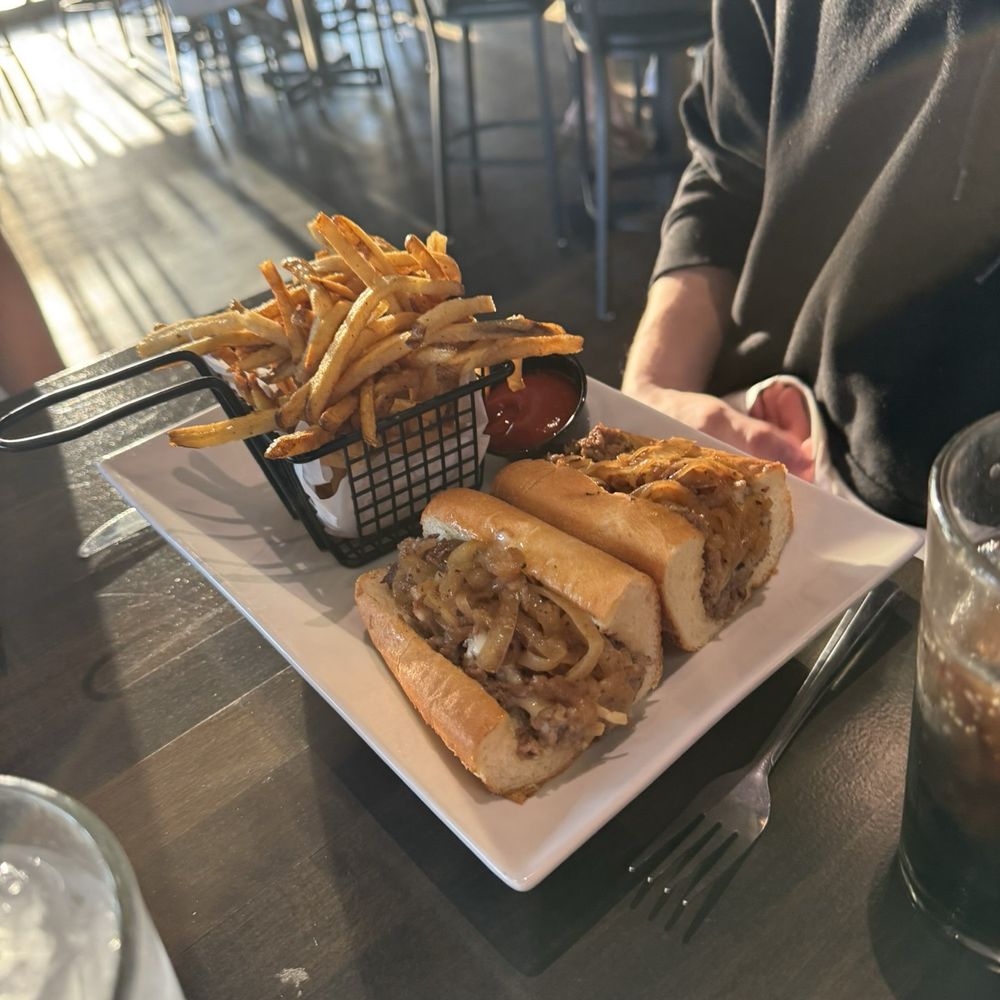The Stillery - Cheesesteak and fries. - Music Venues Near Me - Goodyear, Arizona The Stillery - Cheesesteak and fries. - Music Venues Near Me - Goodyear, Arizona