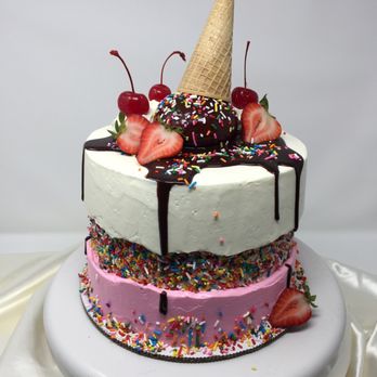 Happy Trails Kitchen - a three layer cake with ice cream, strawberries, cherries, and sprinkles - Cupcakes Near Me