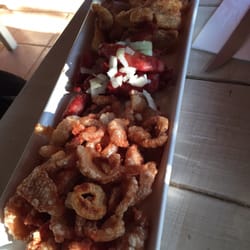 Restaurante Quebra Cangalha - Cangalhinha (entrada de torresmo, linguiça e mandioca)