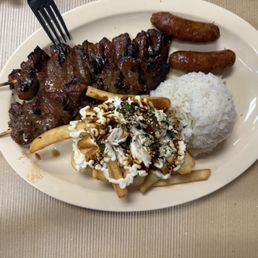 Hurricane fries, steak, pork sausage and rice. Hurricane fries, steak, pork sausage and rice.