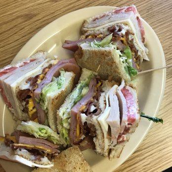 The Garden Grille - a plate of sandwiches on a table - American Near Me - Greenwood, South Carolina The Garden Grille - a plate of sandwiches on a table - American Near Me - Greenwood, South Carolina