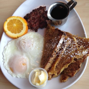 Two Chicks - apple cinnamon French toast combo plate on an egg shaped plate - Breakfast & Brunch Near Me - Reno, Nevada