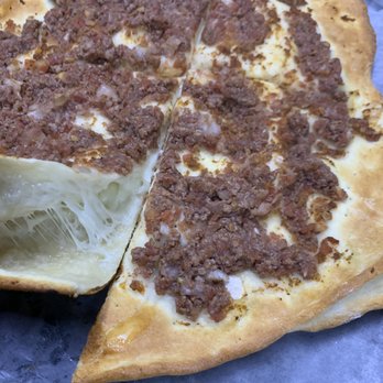 Family Bakery - a half eaten pizza on a table - Bakeries Near Me - Detroit, Michigan Family Bakery - a half eaten pizza on a table - Bakeries Near Me - Detroit, Michigan