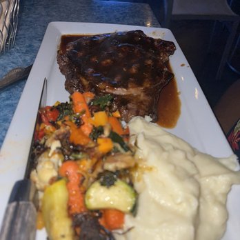 Poseidon - Steak, seasoned veggies and mashed potatoes - Seafood Near Me - Hilton Head Island, South Carolina