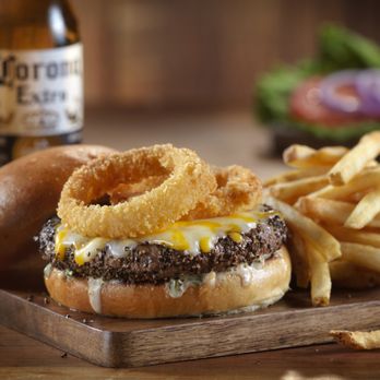 Lone Star Texas Grill - a burger with onion rings - Tex-Mex Near Me - Kingston, Ontario Lone Star Texas Grill - a burger with onion rings - Tex-Mex Near Me - Kingston, Ontario