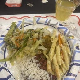 Red Beans and rice; Rasta pasta; cabbage and curry chicken Red Beans and rice; Rasta pasta; cabbage and curry chicken