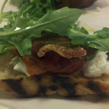 Cane Rosso - App of argula, crispy pancetta, roasted tomato and soft cheese on toasted garlic bread. BLT lovers DREAM. - Pizza Near Me - Dallas, Texas