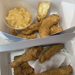 Super Tender Meal with Macaroni and Cheese, and a 4 piece snack dark. Super Tender Meal with Macaroni and Cheese, and a 4 piece snack dark.