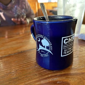 Marina Variety Store Restaurant - a blue coffee cup with a spoon in it - Seafood Near Me - Charleston, South Carolina